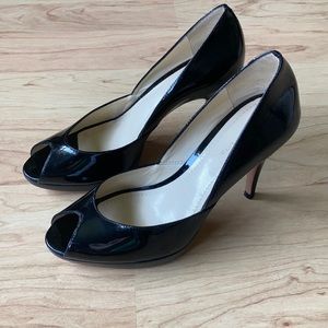Ann Taylor black patent peep toed heels. Size 6.